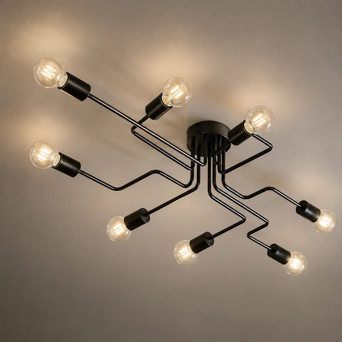 Plafonnier LED Ampoules Apparentes Design Noir en gros plan, métal laqué mat